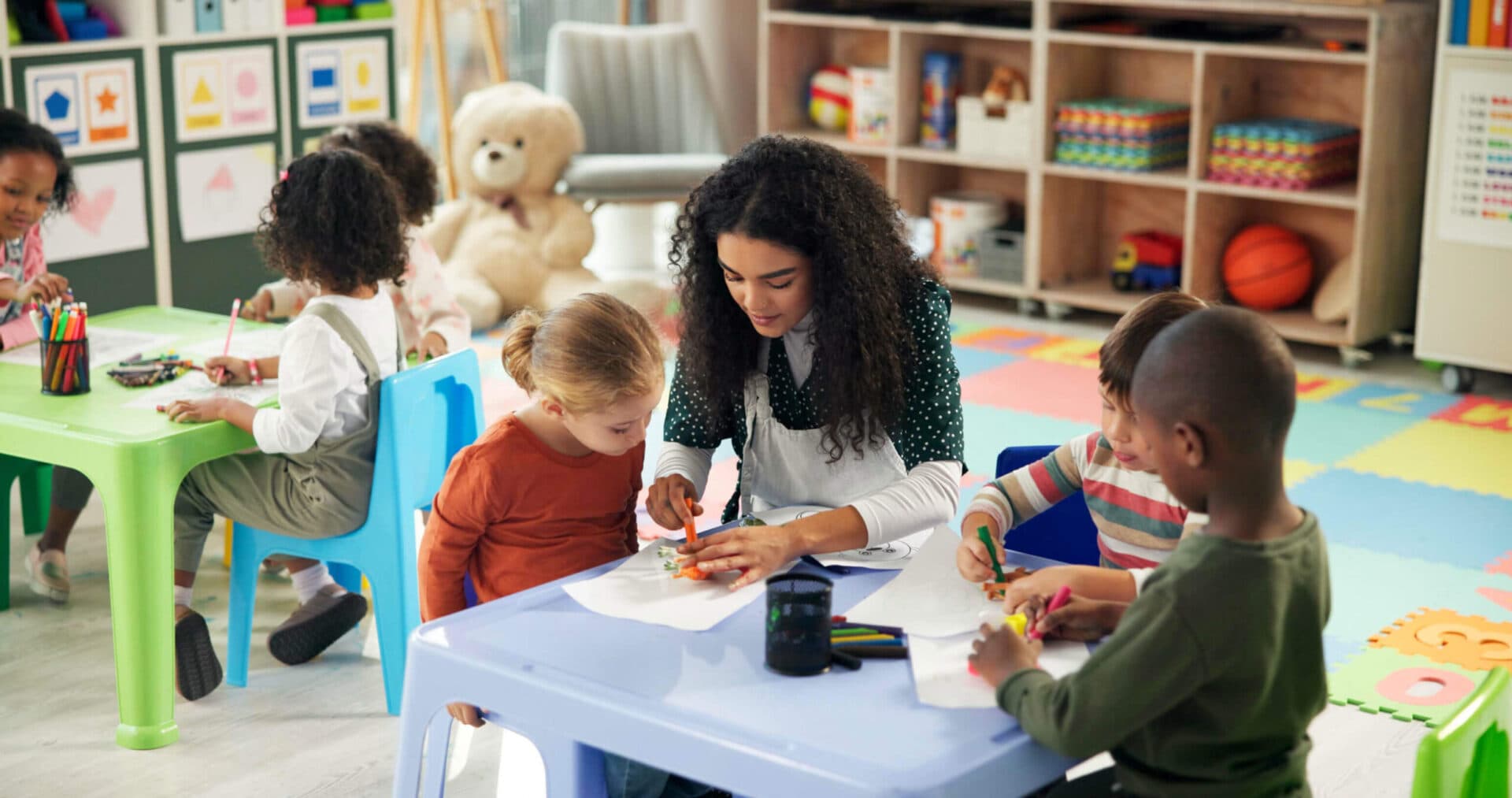 A Morgan’s Early Learning Centers teacher working with children