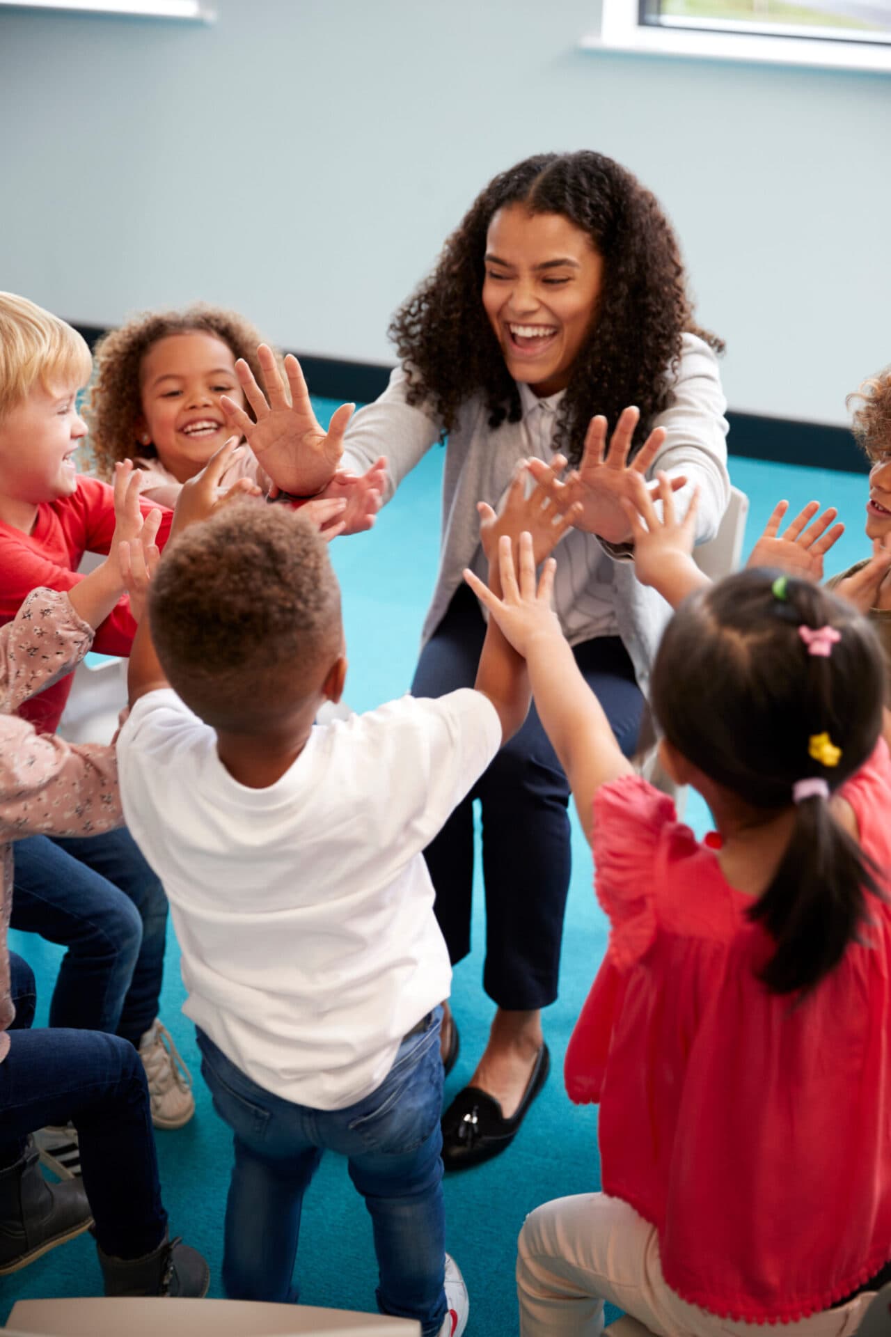 A Morgan’s Early Learning Centers teacher reading with children